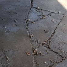 Extreme settling and cracking in garage floor